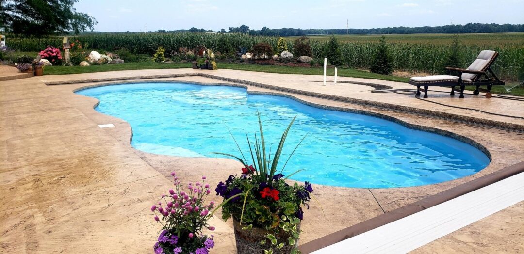 A freeform fiberglass pool